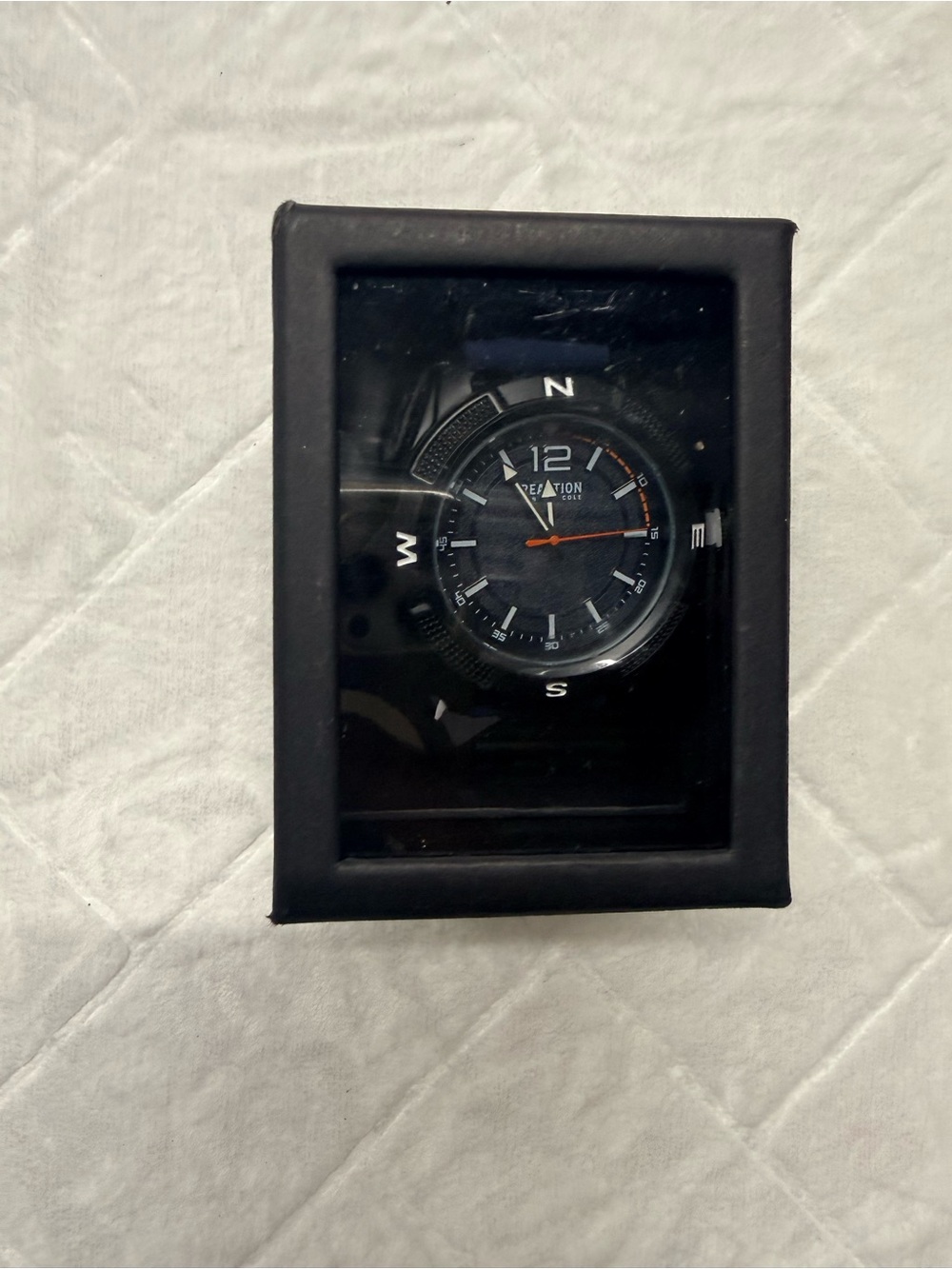 Kenneth Cole Black Dial Watch with Orange Accent